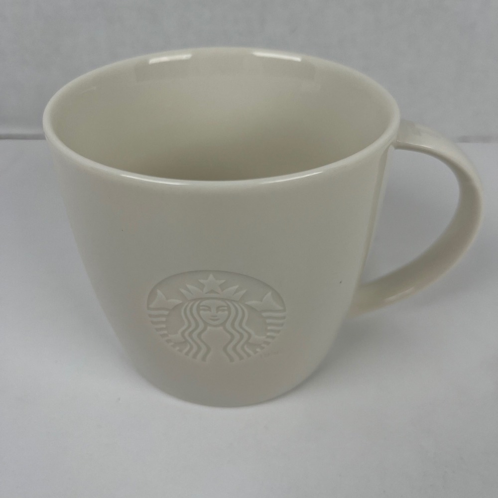 Starbucks 2010 Tall Coffee Mug White Embossed Siren Logo 12oz Ceramic Cup